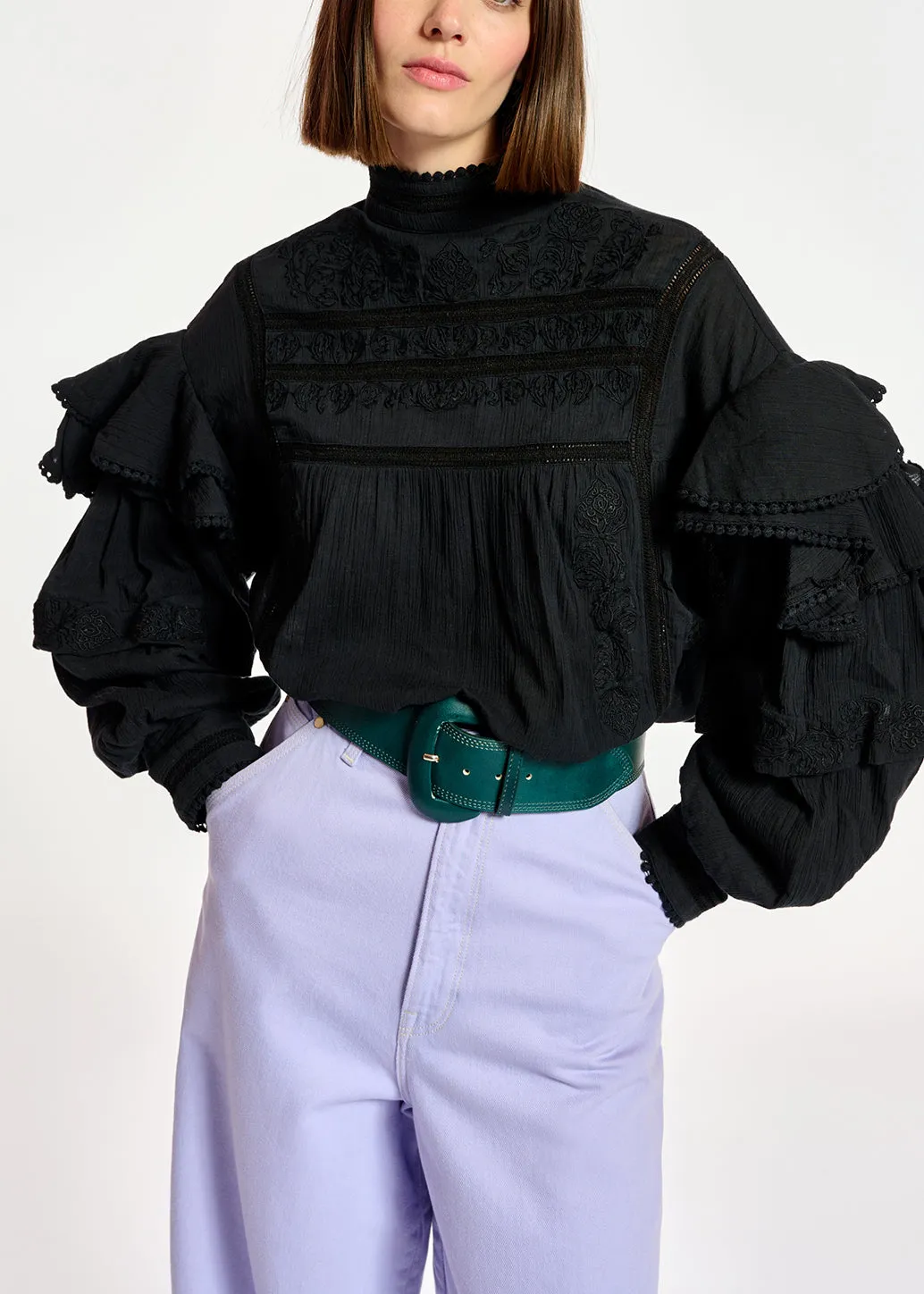 Black ruffled lace-trimmed top